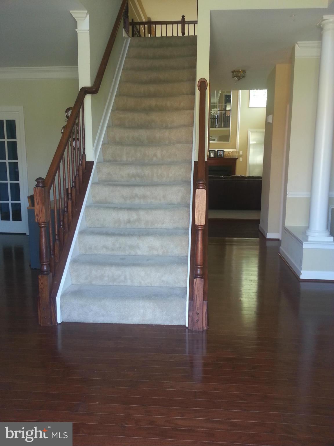 2000 Medinah Ridge Road Accokeek, MD 20607 - Photo 2 of 20 a view of entryway and hall with wooden floor