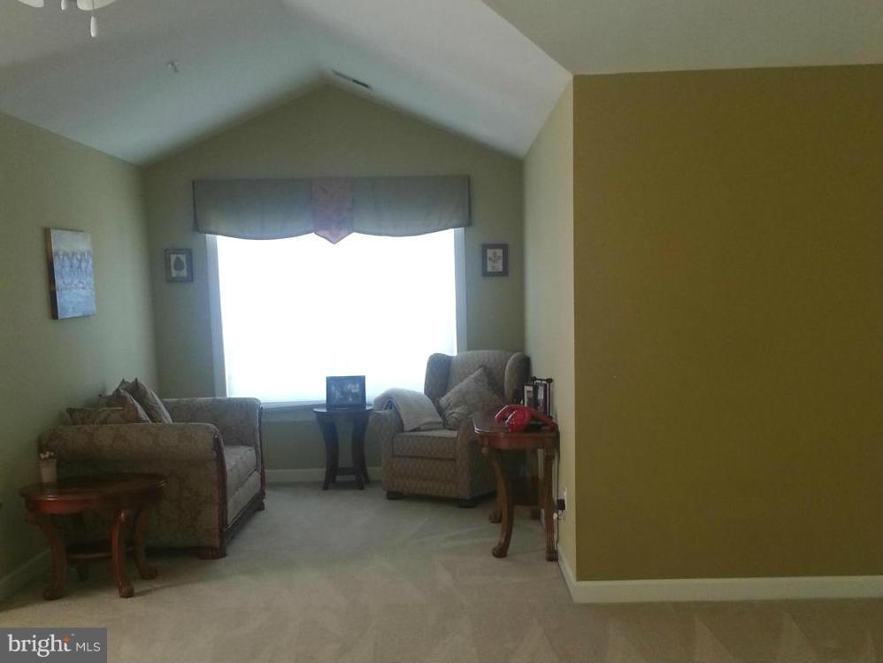 2000 Medinah Ridge Road Accokeek, MD 20607 - Photo 11 of 20 a living room with furniture and a window