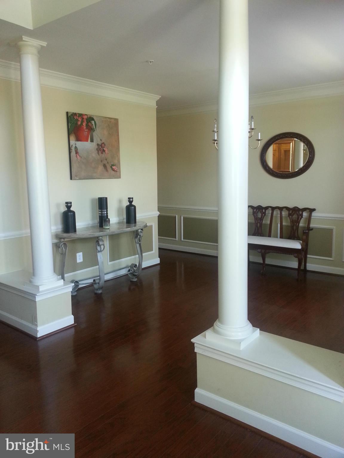 2000 Medinah Ridge Road Accokeek, MD 20607 - Photo 3 of 20 a living room with furniture and a wooden floor