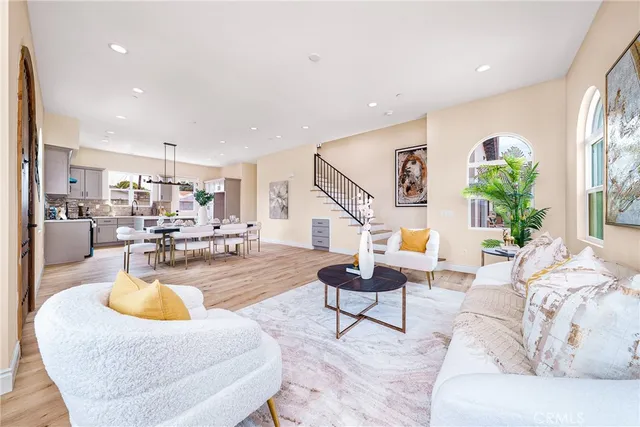 a living room with furniture and a table