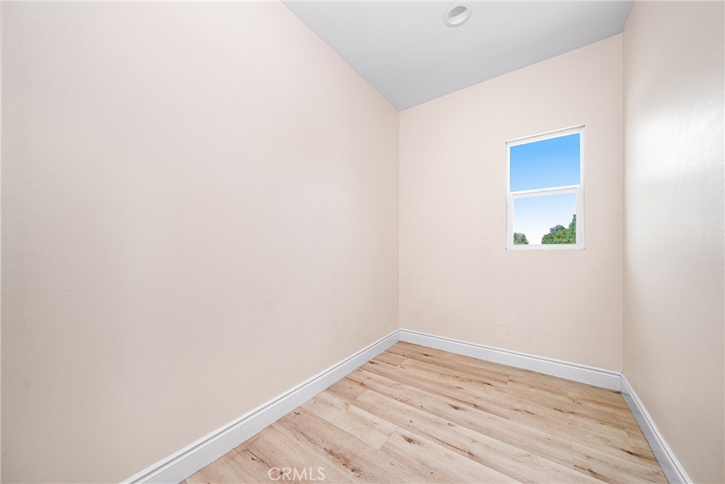 2709 Cogswell Road, Unit A El Monte, CA 91732 - Photo 23 of 57 a view of a small space with wooden floor and a window