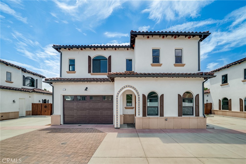 2709 Cogswell Road, Unit A El Monte, CA 91732 - Photo 24 of 57 a view of a white house with a sink and a garage