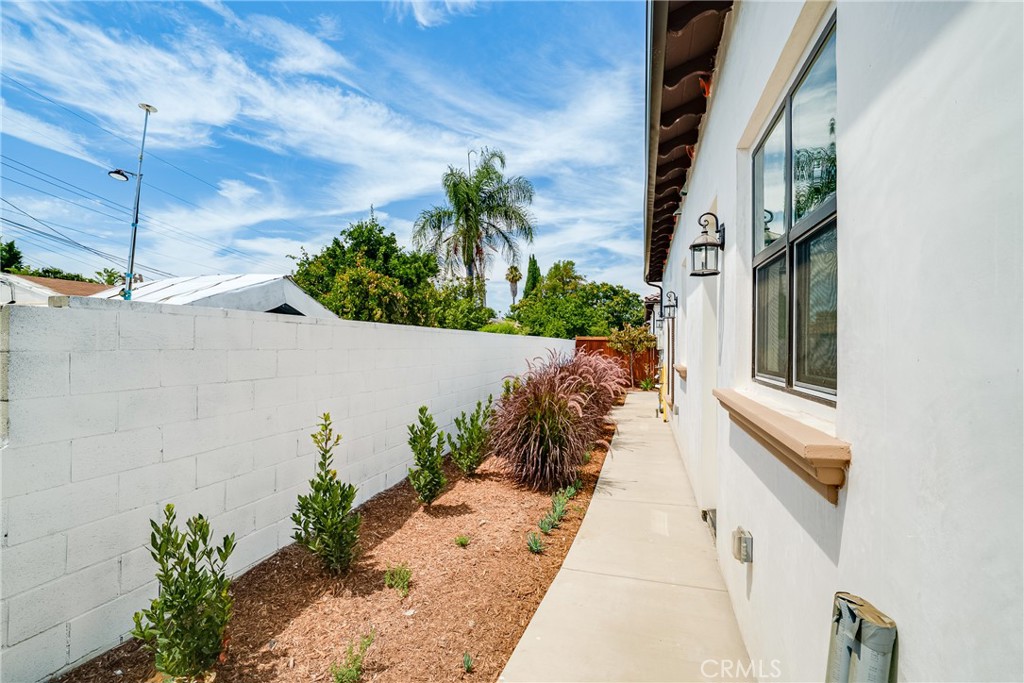 2709 Cogswell Road, Unit A El Monte, CA 91732 - Photo 36 of 57 a view of a pathway along with potted plants