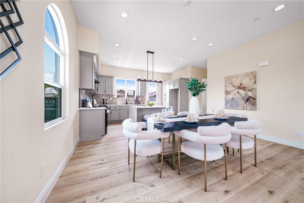 2709 Cogswell Road, Unit A El Monte, CA 91732 - Photo 5 of 57 a view of a dining room with furniture window and wooden floor