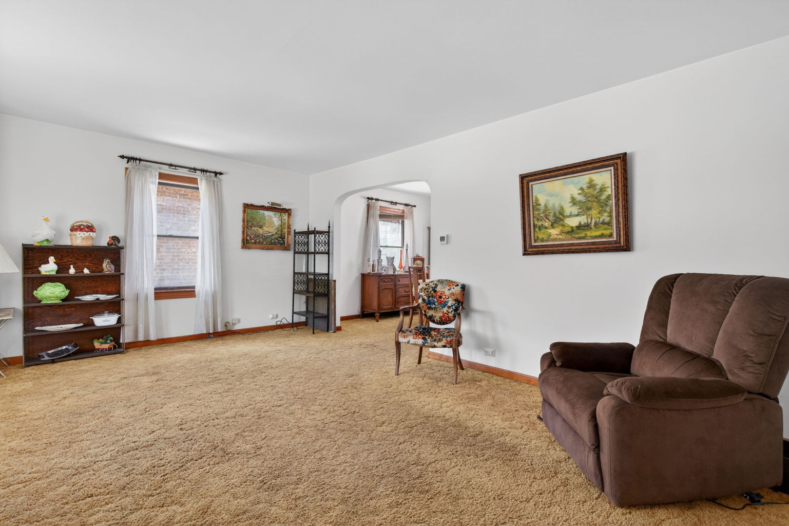 9020 West Forestview Drive North Riverside, IL 60546 - Photo 2 of 19 a living room with furniture and a window
