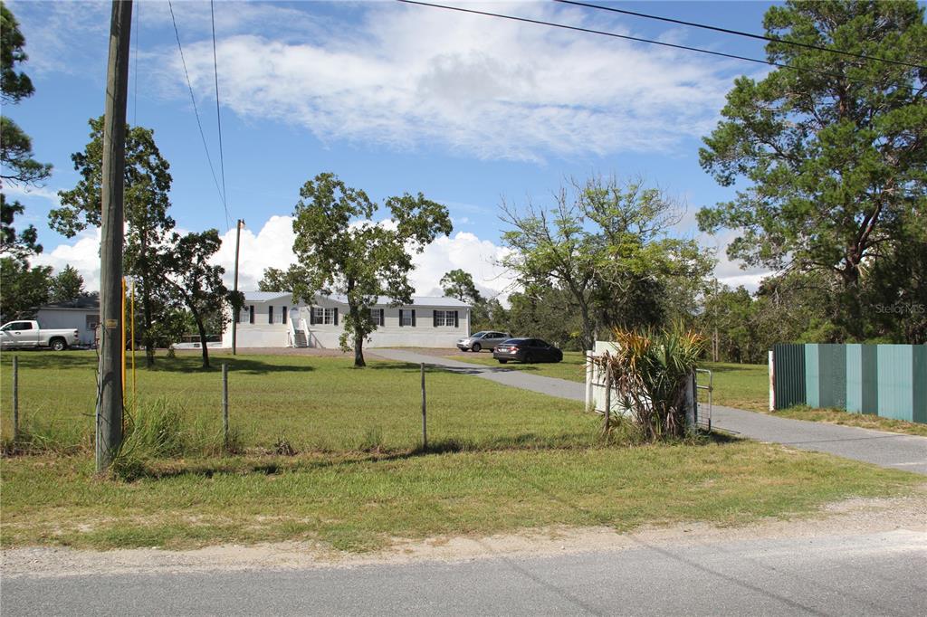 13127 Star Road Brooksville, FL 34613 - Photo 31 of 54 a view of a park with tree s