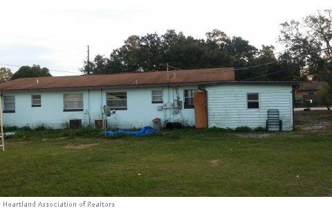 4103 Sparta Road Sebring, FL 33875 - Photo 6 of 6 a view of a house with a yard
