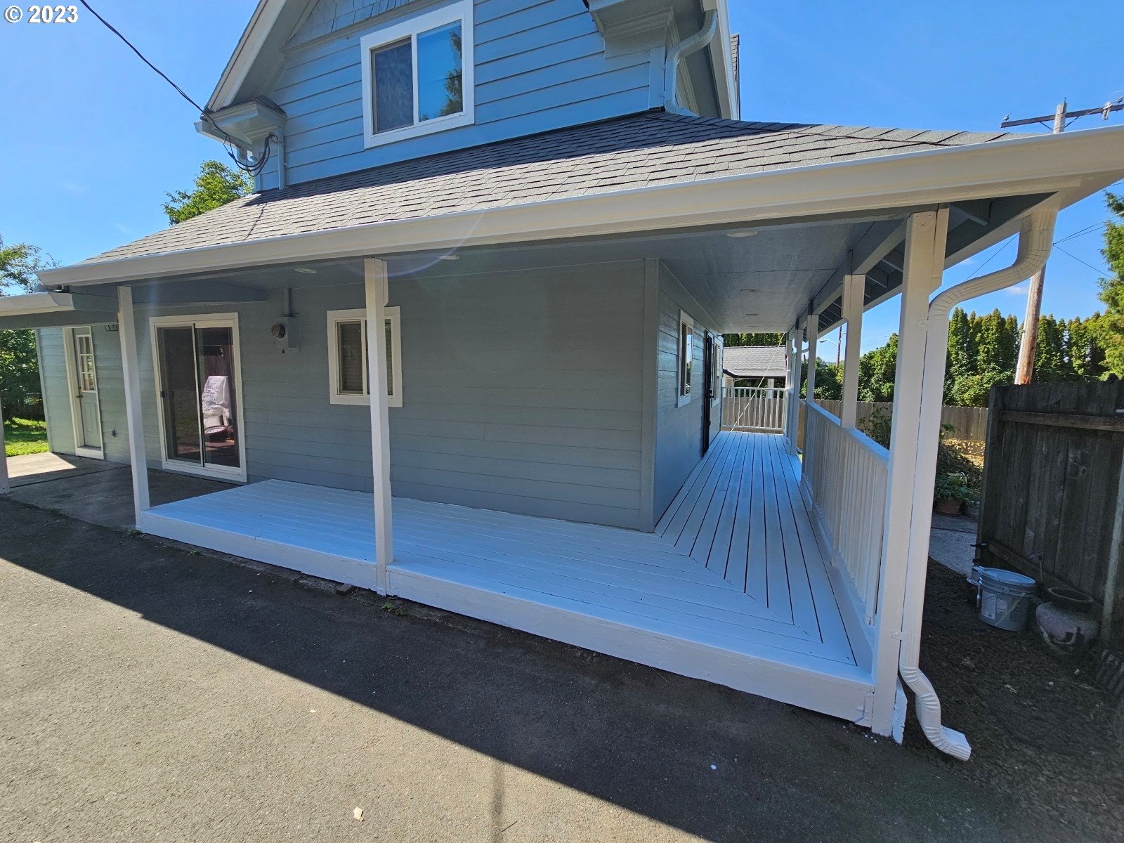 7 Elm Street Ridgefield, WA 98642 - Photo 2 of 2 a view of a porch with wooden floor and stairs