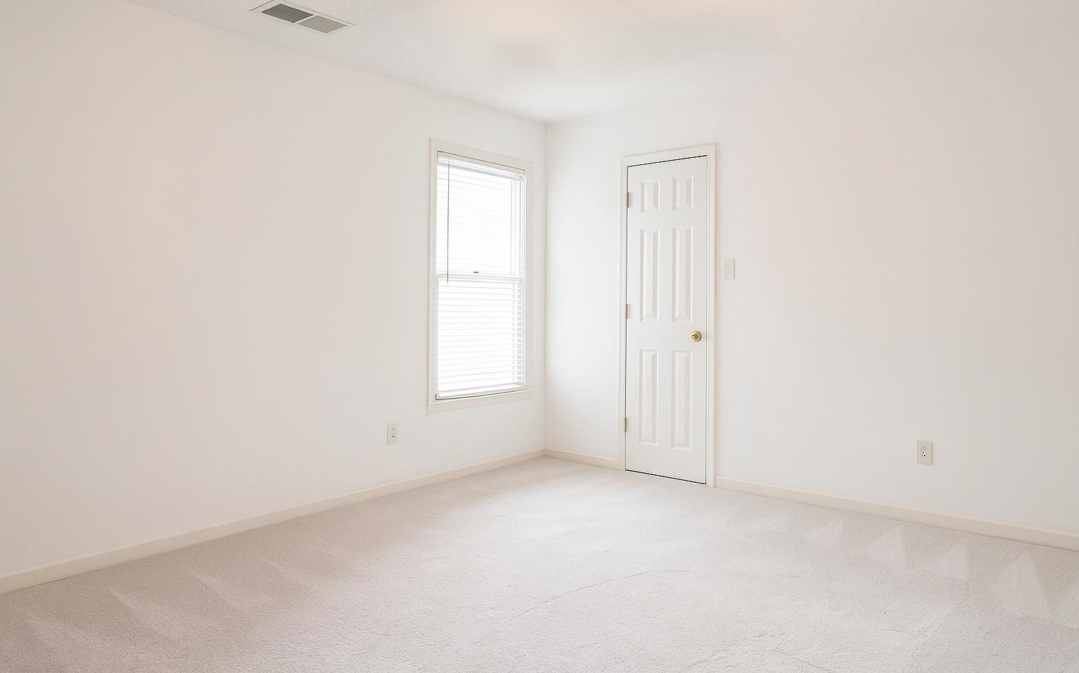 1923 Rye Road Germantown, TN 38139 - Photo 4 of 34 Spare room with light carpet and baseboards