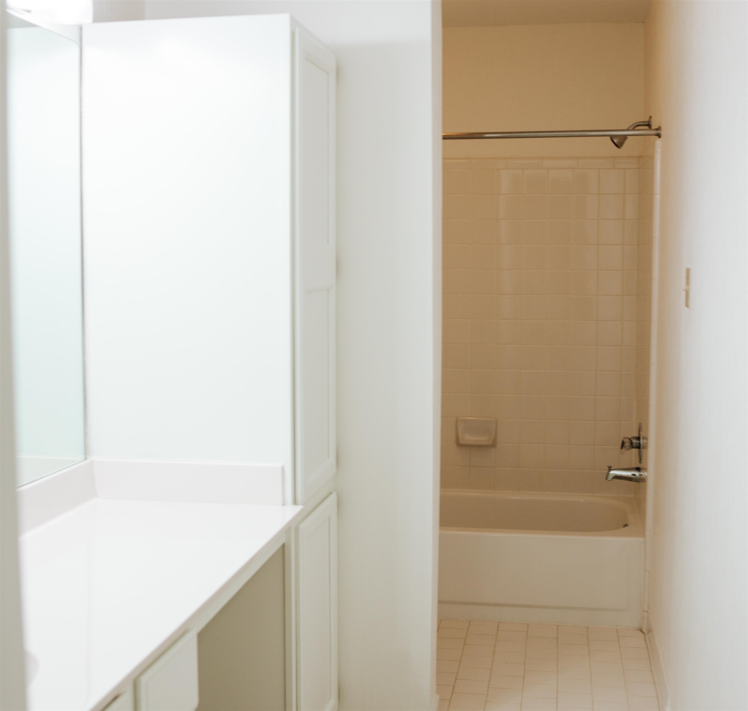 1923 Rye Road Germantown, TN 38139 - Photo 9 of 34 Bathroom with vanity, shower combination, and light tile patterned floors