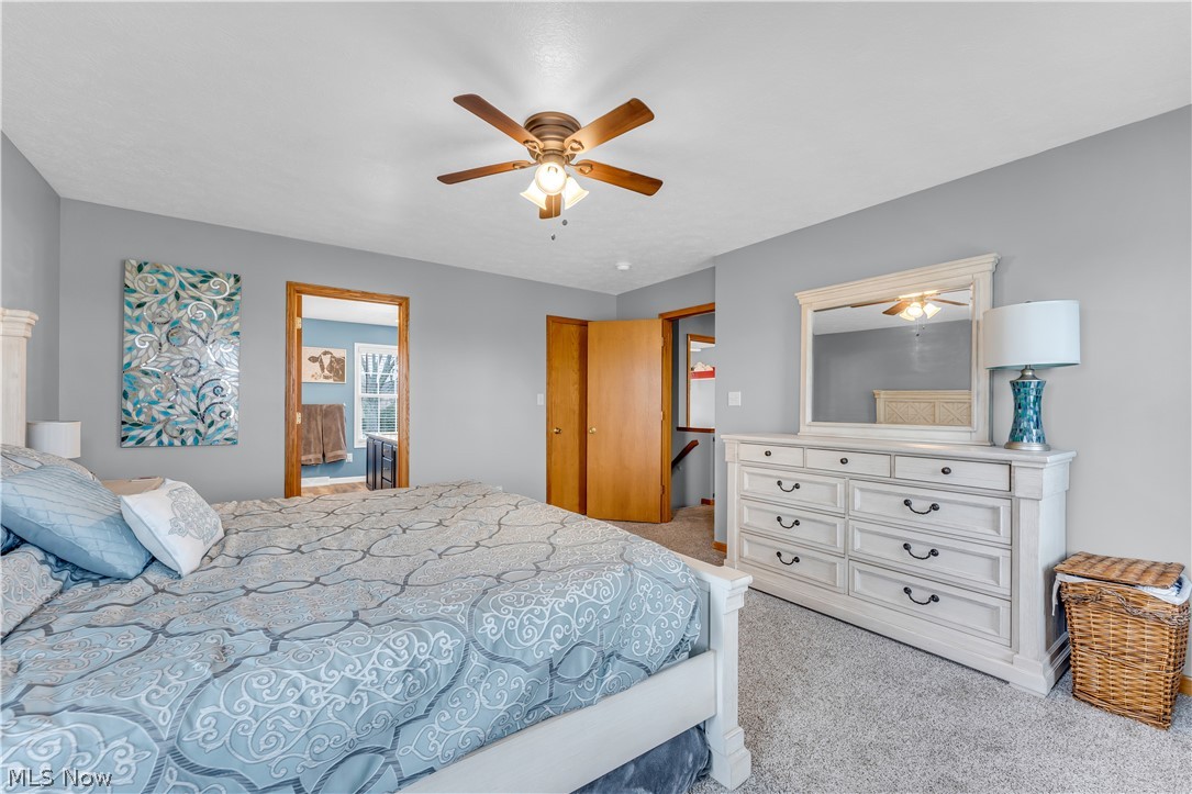 2560 Blake Road Wadsworth, OH 44281 - Photo 25 of 30 Bedroom with light carpet and ceiling fan