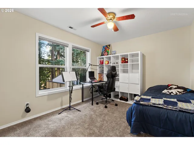 a workspace with furniture and window