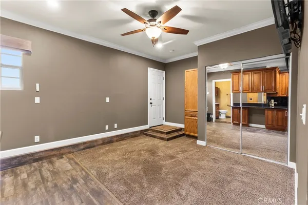 a view of an empty room and window