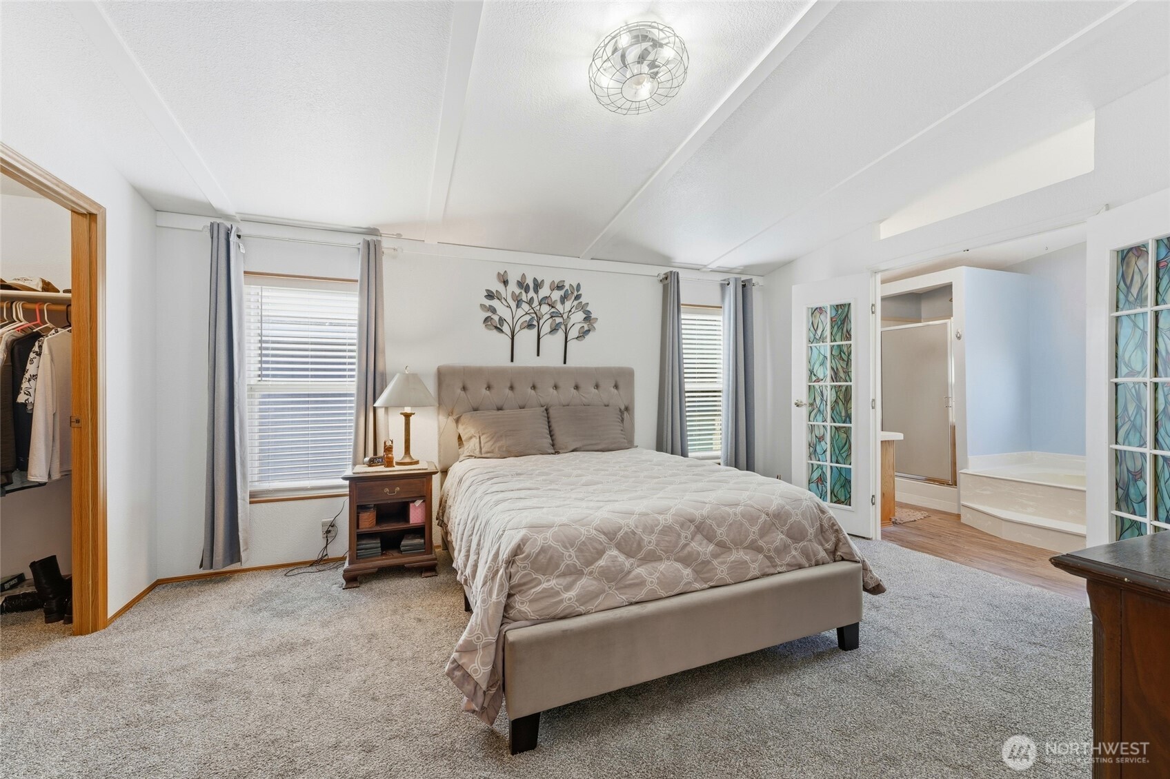 1352 Rancho Villa Walla Walla, WA 99362 - Photo 23 of 35 a bedroom with a bed couch and a window