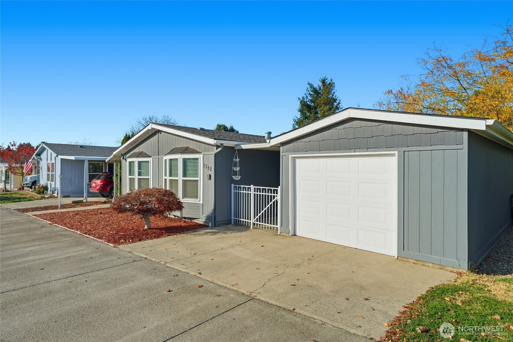 1352 Rancho Villa Walla Walla, WA 99362 - Photo 3 of 35 a front view of a house with a yard