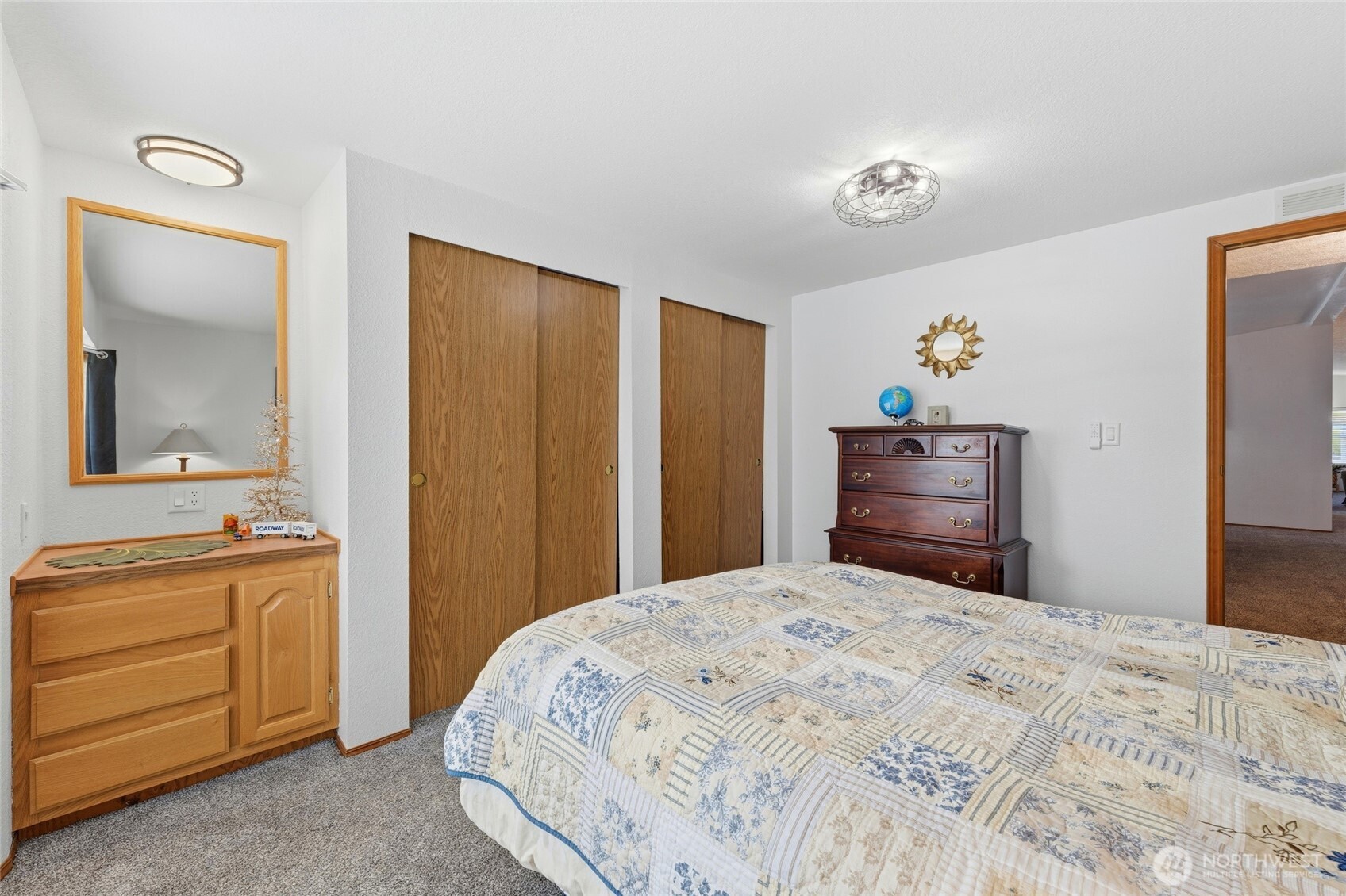 1352 Rancho Villa Walla Walla, WA 99362 - Photo 33 of 35 a bedroom with a bed and a dresser