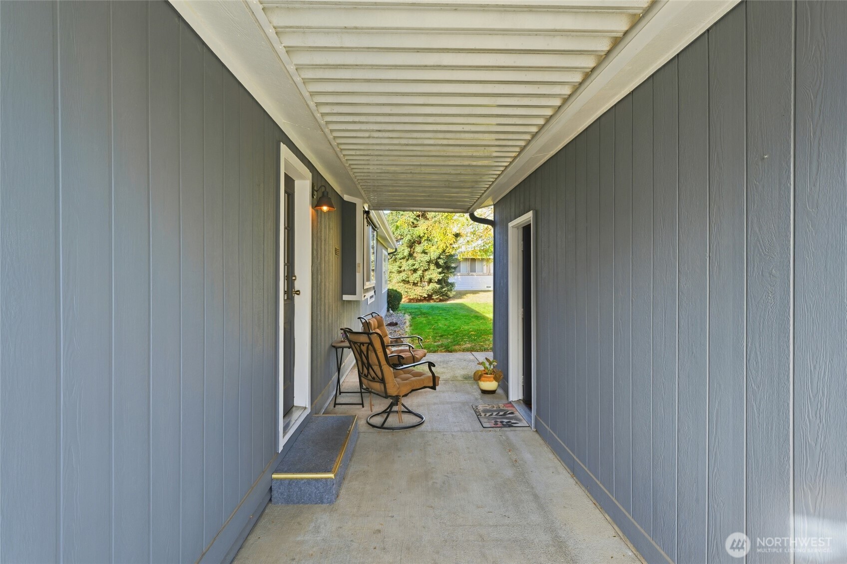 1352 Rancho Villa Walla Walla, WA 99362 - Photo 6 of 35 a view of a patio with table and chairs and couches with wooden floor