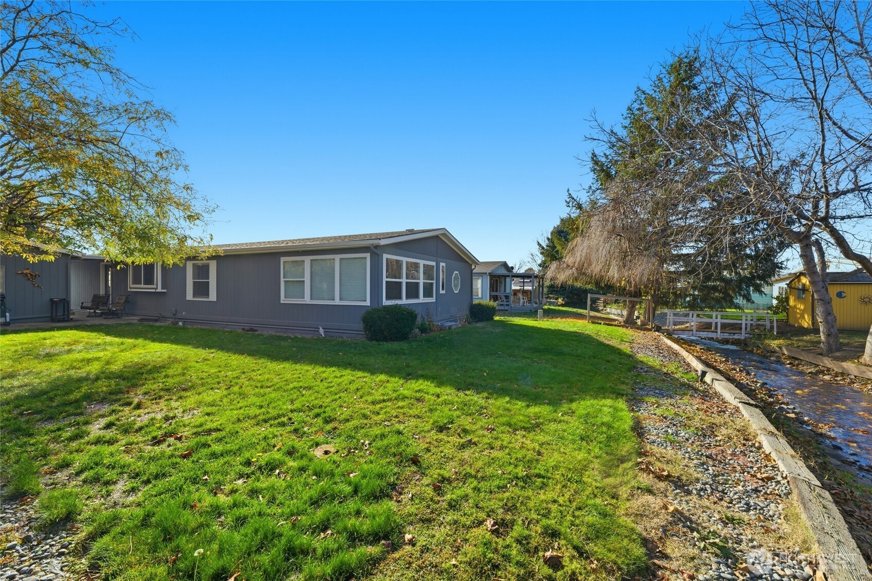 1352 Rancho Villa Walla Walla, WA 99362 - Photo 8 of 35 a view of a house with a yard