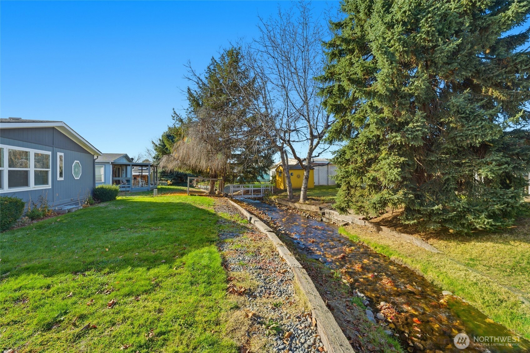 1352 Rancho Villa Walla Walla, WA 99362 - Photo 9 of 35 a view of a house with a yard