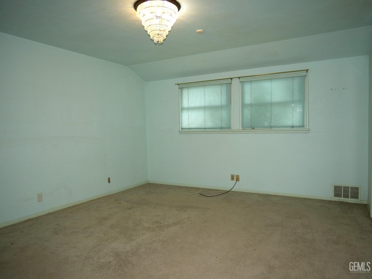 Undisclosed Address Delano, CA 93215 - Photo 5 of 7 an empty room with a window