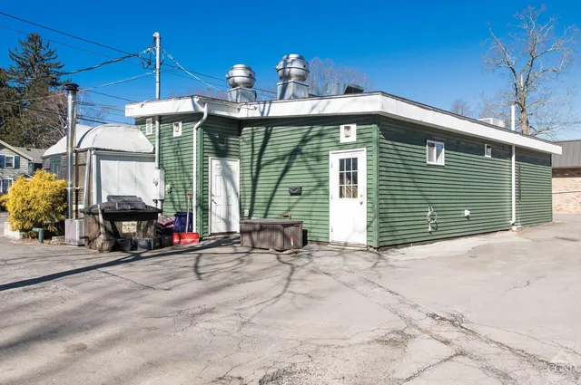 a front view of a house with patio