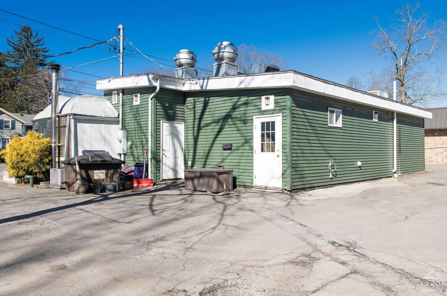 7550 North Broadway Red Hook, NY 12571 - Photo 12 of 19 a front view of a house with patio