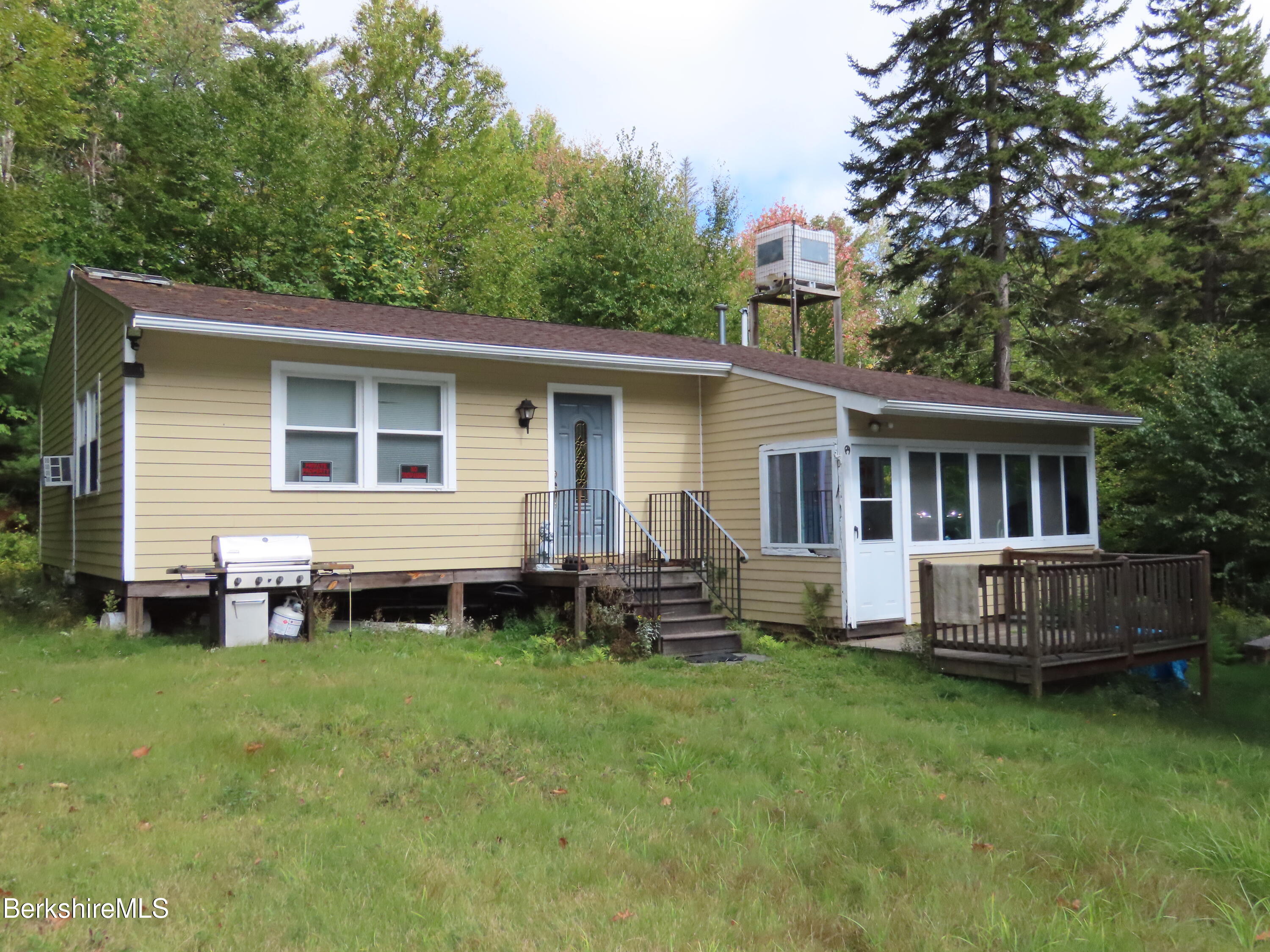 250 Magee Road Stamford, VT 05352 - Photo 22 of 35 a front view of house with yard and green space