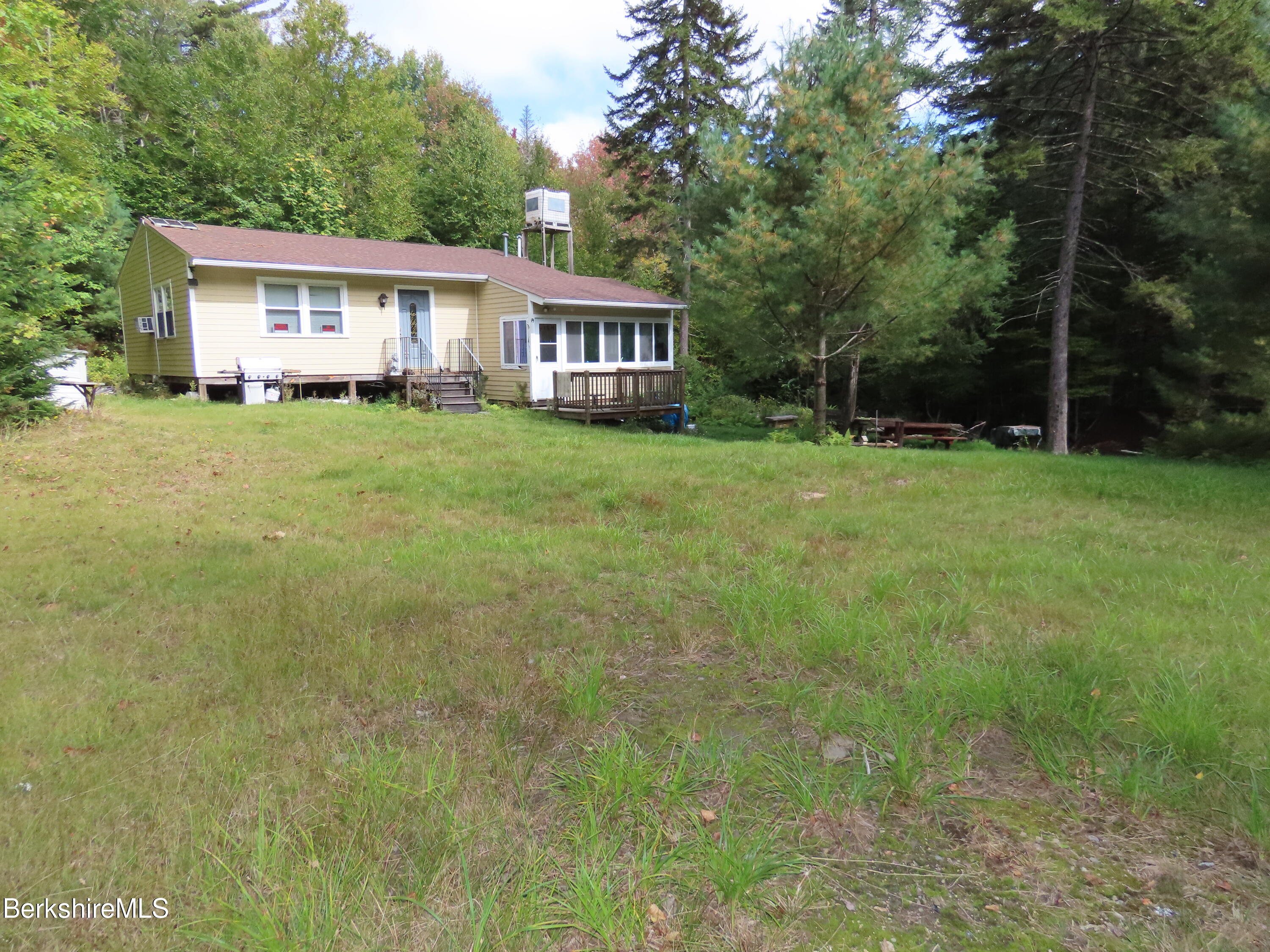 250 Magee Road Stamford, VT 05352 - Photo 23 of 35 a house view with a garden space