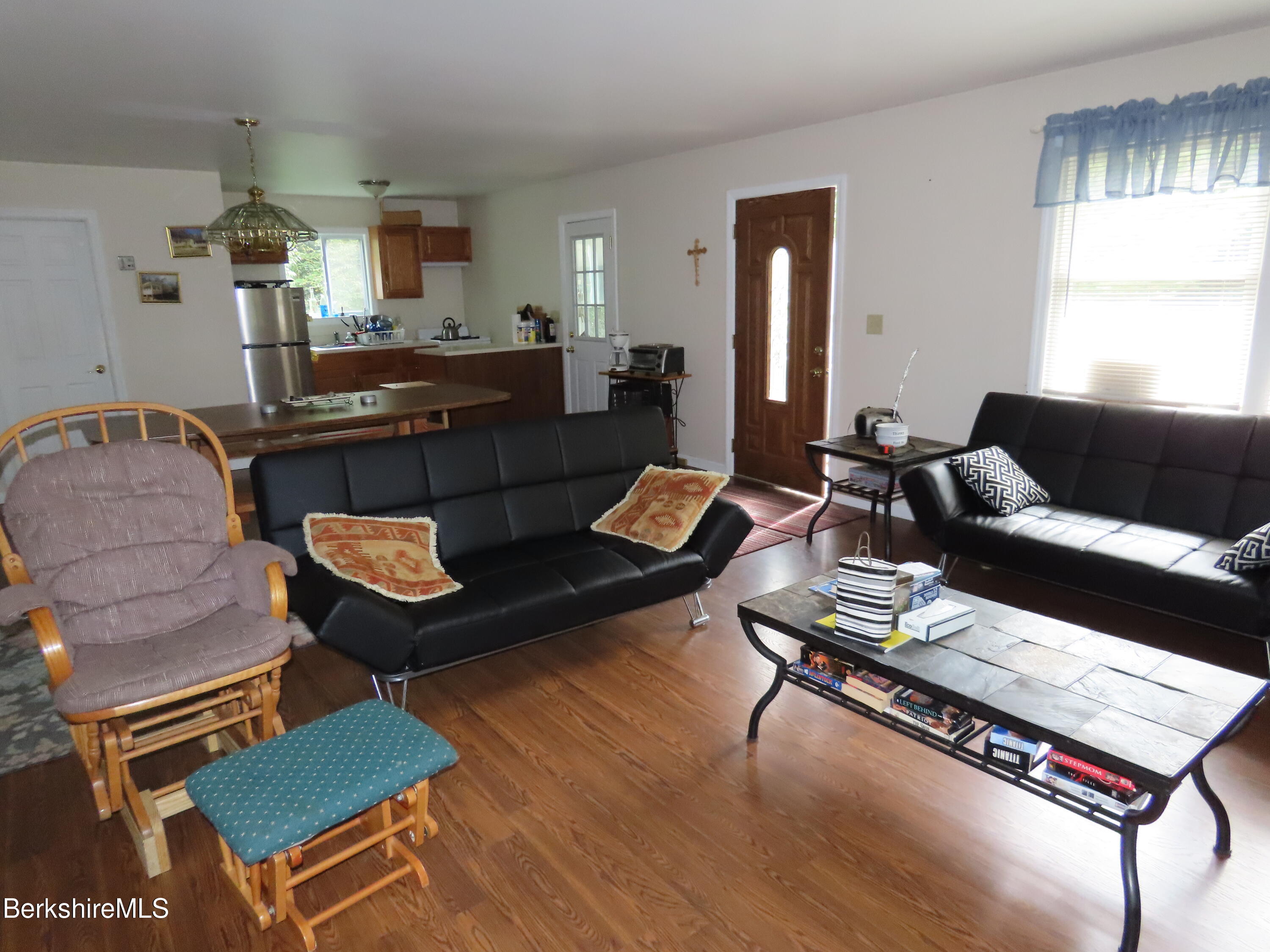 250 Magee Road Stamford, VT 05352 - Photo 9 of 35 a living room with furniture and wooden floor