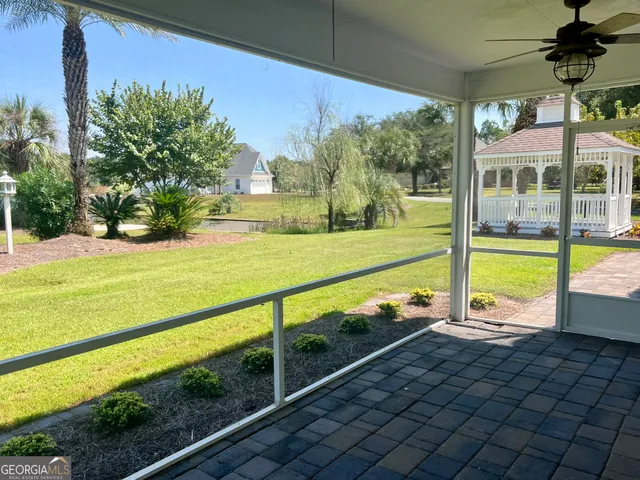 a view of swimming pool with seating space