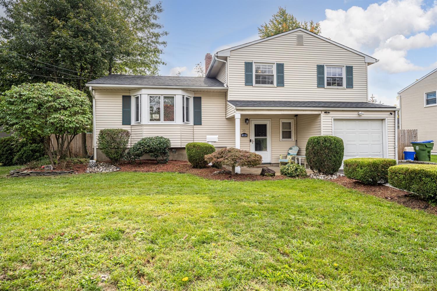 20 Outcalt Road Edison, NJ 08817 - Photo 1 of 35 a front view of a house with garden