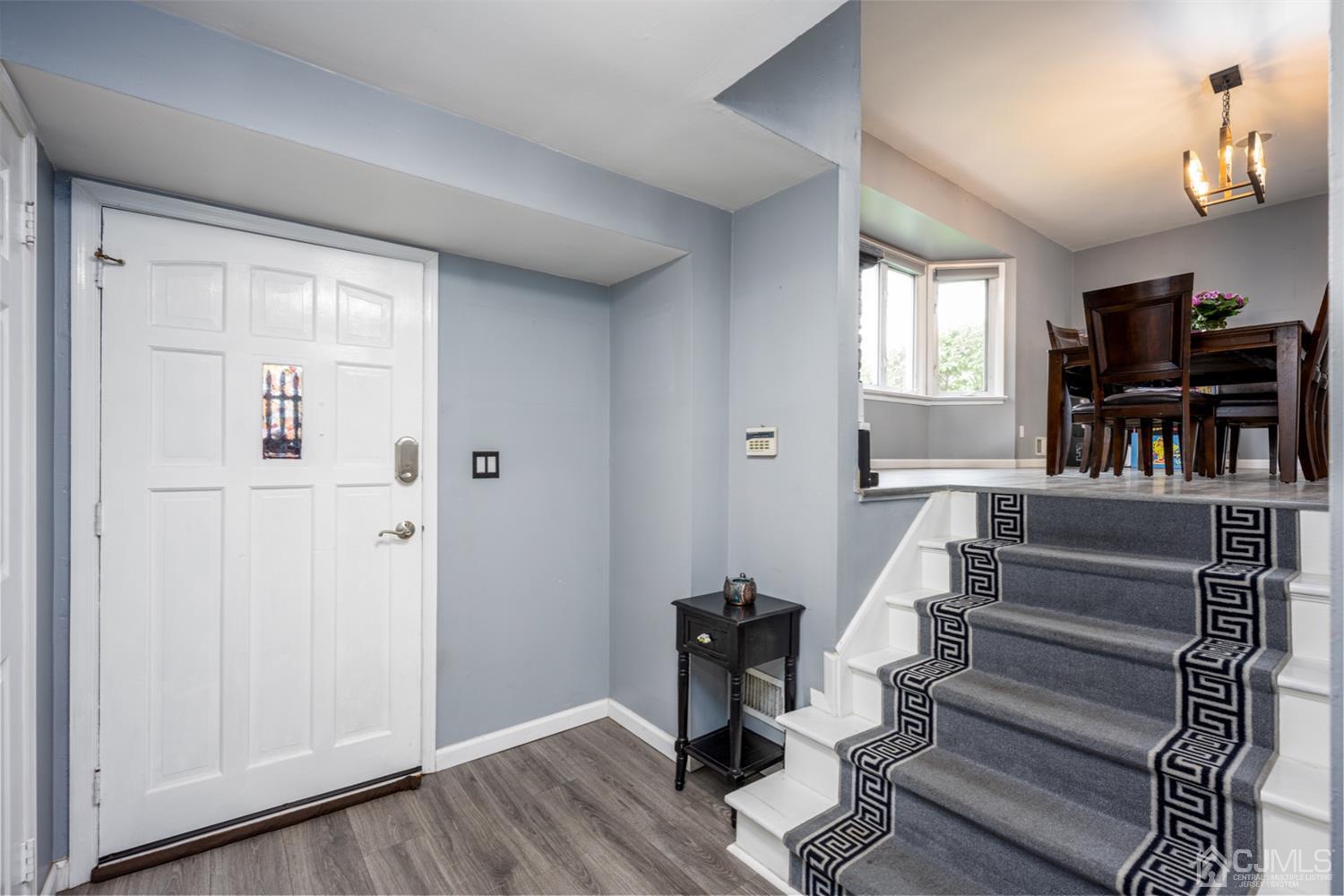 20 Outcalt Road Edison, NJ 08817 - Photo 16 of 35 a view of entryway and hall with wooden floor