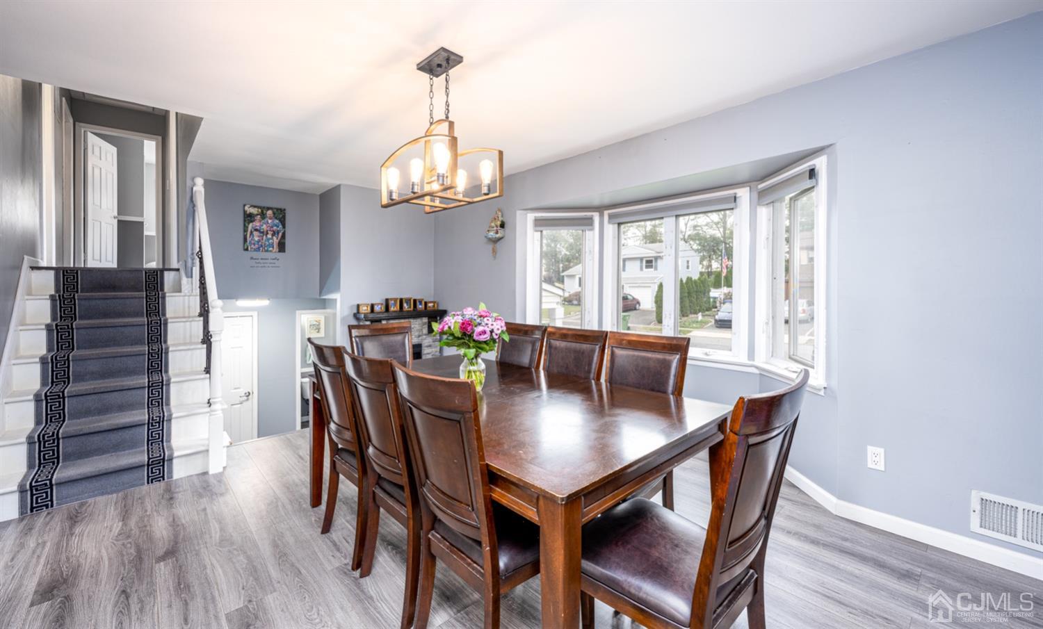 20 Outcalt Road Edison, NJ 08817 - Photo 22 of 35 a view of a dining room with furniture window and wooden floor