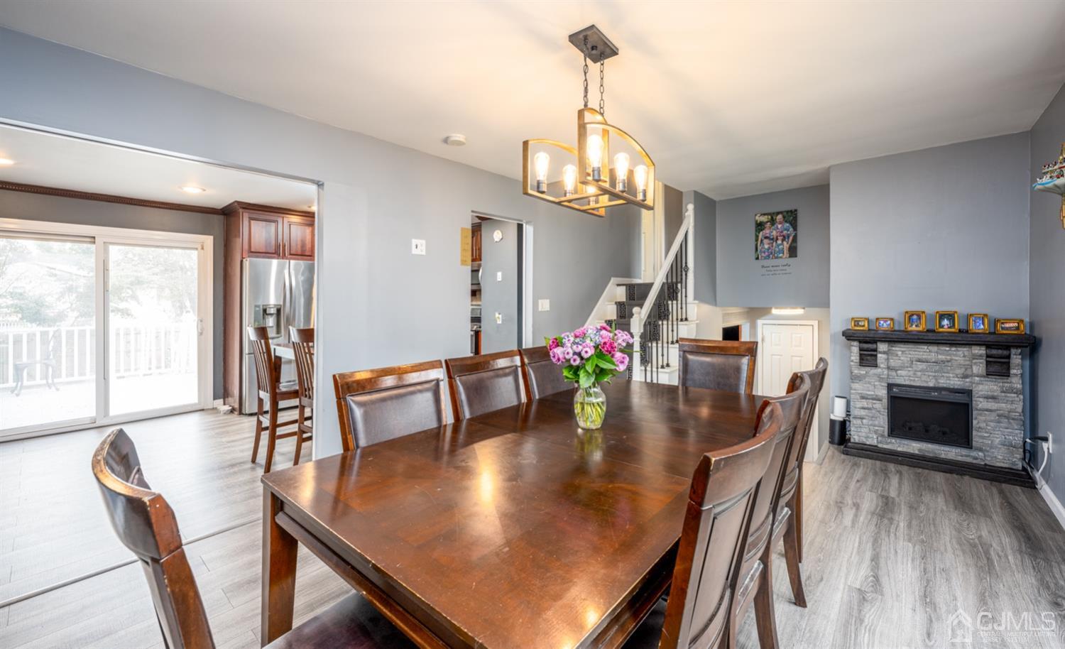 20 Outcalt Road Edison, NJ 08817 - Photo 23 of 35 a dining room with furniture a chandelier and wooden floor