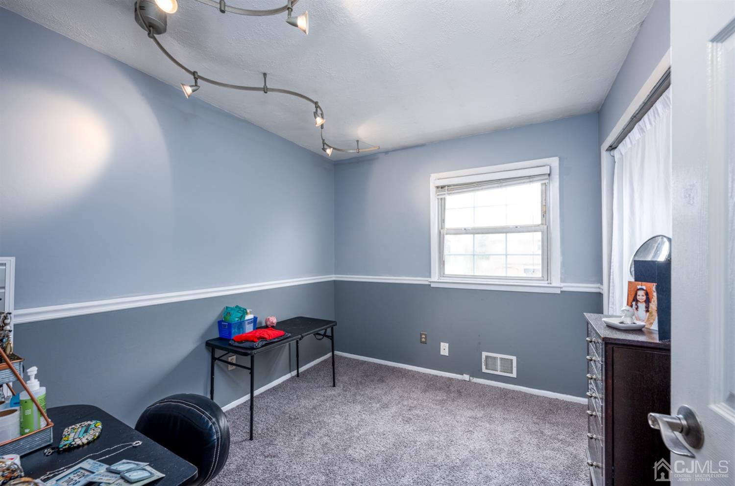 20 Outcalt Road Edison, NJ 08817 - Photo 28 of 35 a room that has a window and a wooden floor