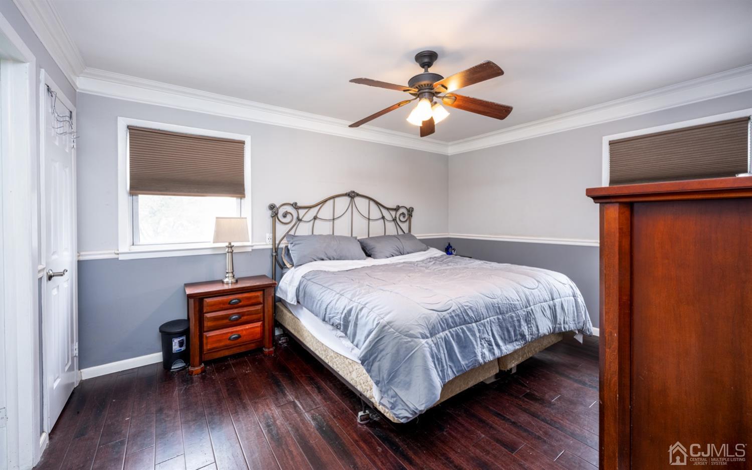 20 Outcalt Road Edison, NJ 08817 - Photo 31 of 35 a bedroom with a bed and a chandelier