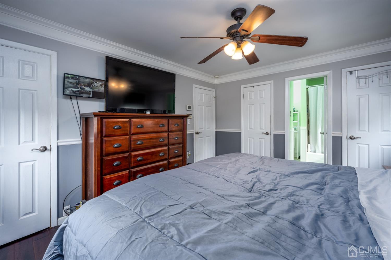 20 Outcalt Road Edison, NJ 08817 - Photo 33 of 35 a bedroom with a bed and a flat screen tv