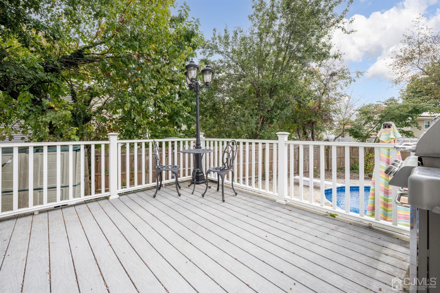 20 Outcalt Road Edison, NJ 08817 - Photo 10 of 35 a balcony with wooden floor and fence