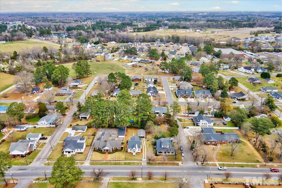602 West Main Street Benson, NC 27504 - Photo 33 of 42 an aerial view of residential building and lake view