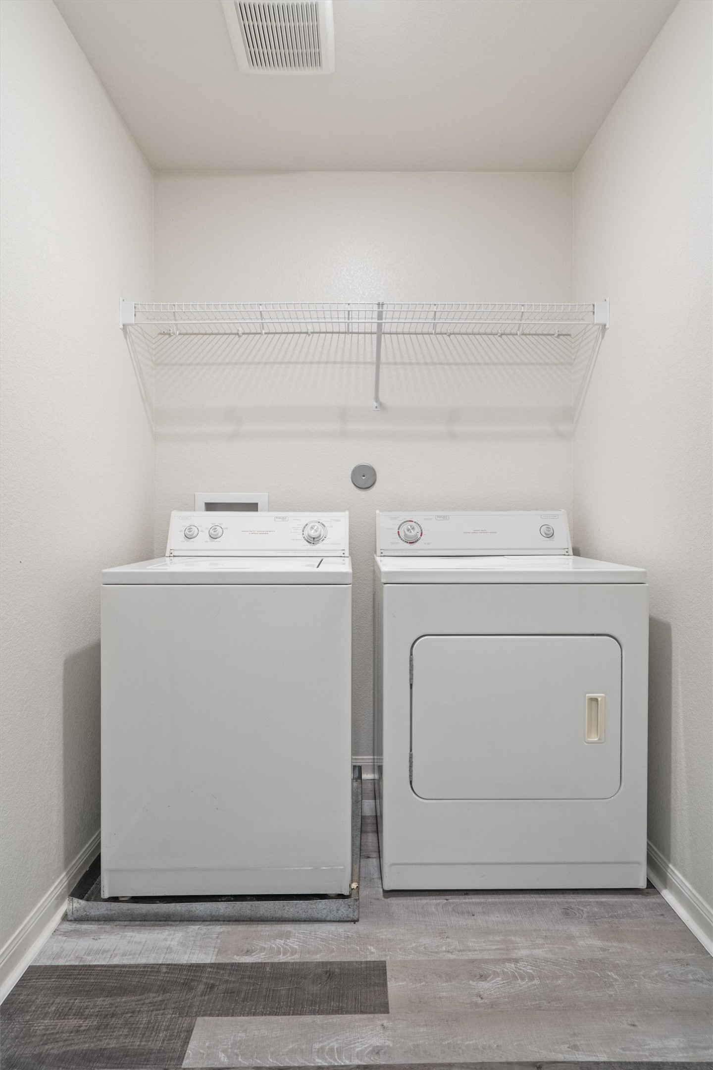 163 Niven Path, Unit 12K Jarrell, TX 76537 - Photo 37 of 39 Laundry room located on the 2nd floor. The washer and dryer convey with the sale!