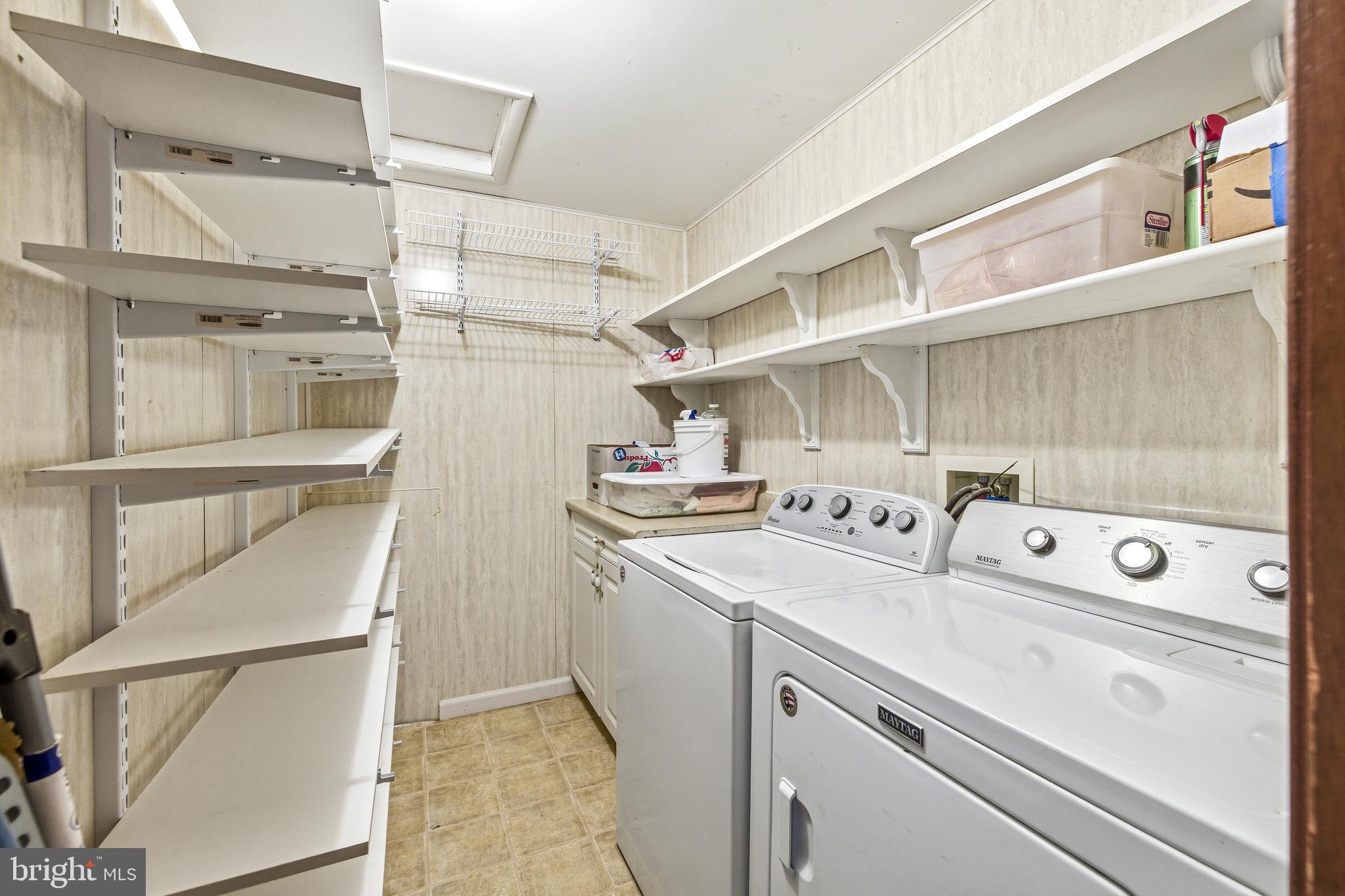 5009 Mill Creek Road Luray, VA 22835 - Photo 27 of 87 a utility room with dryer and washer