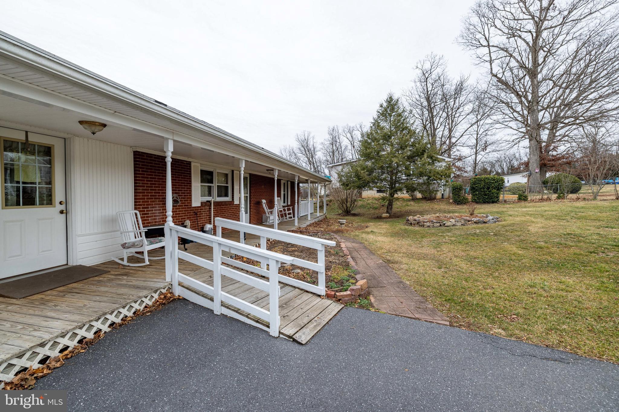 5009 Mill Creek Road Luray, VA 22835 - Photo 45 of 87 a view of a house with a big yard and large tree