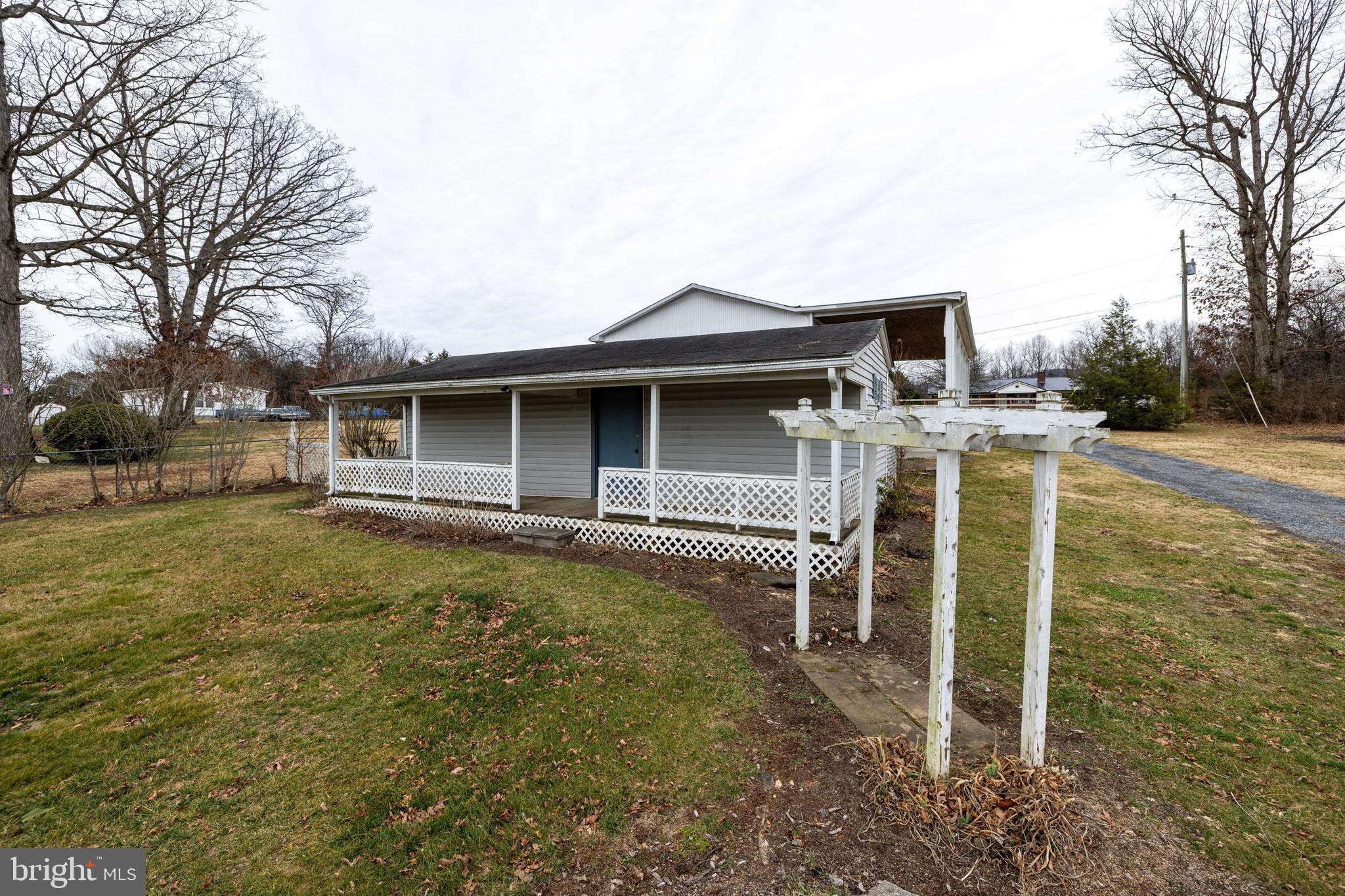 5009 Mill Creek Road Luray, VA 22835 - Photo 51 of 87 a backyard of a house with table and chairs
