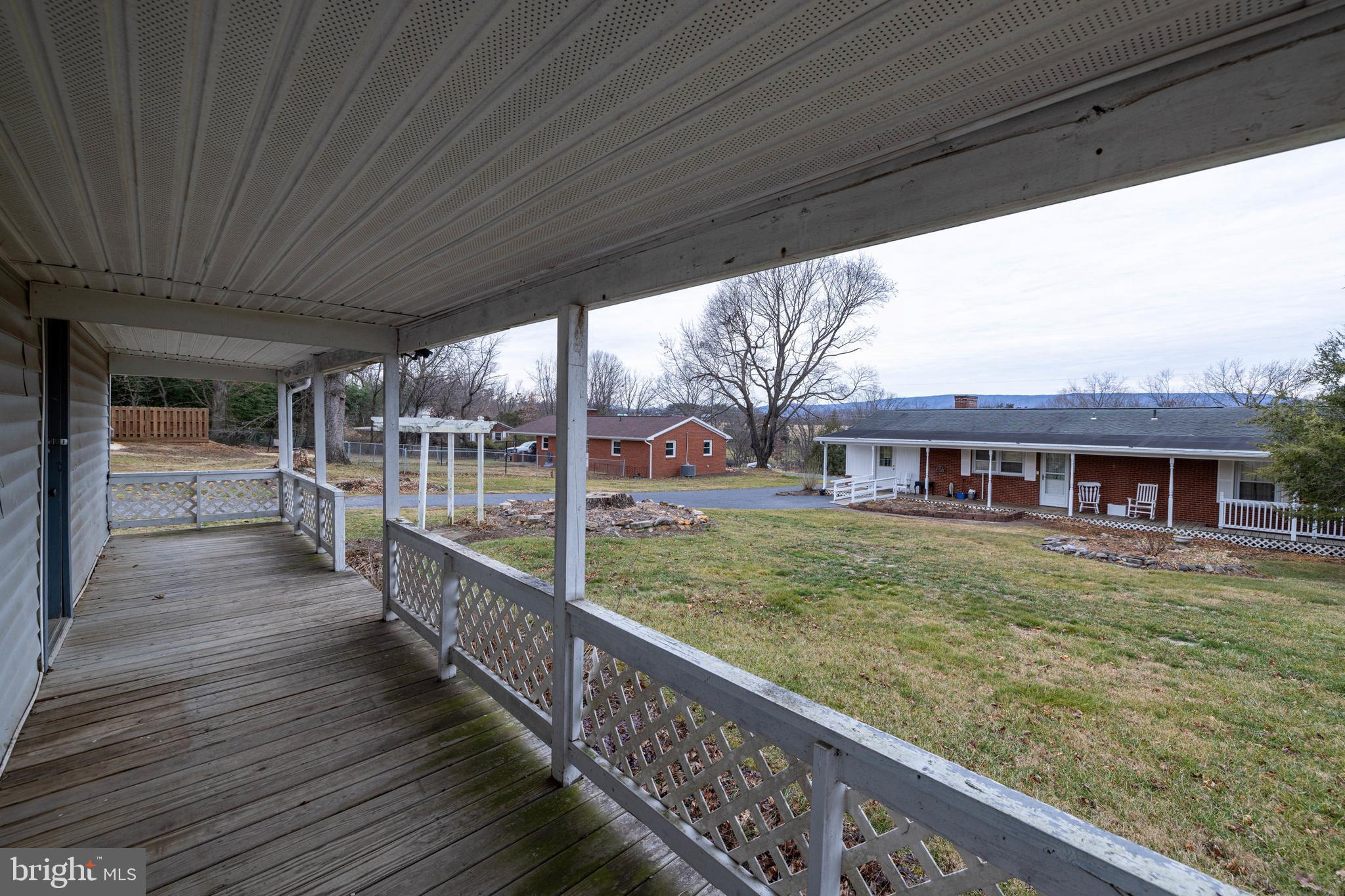 5009 Mill Creek Road Luray, VA 22835 - Photo 52 of 87 a view of a house with backyard and porch