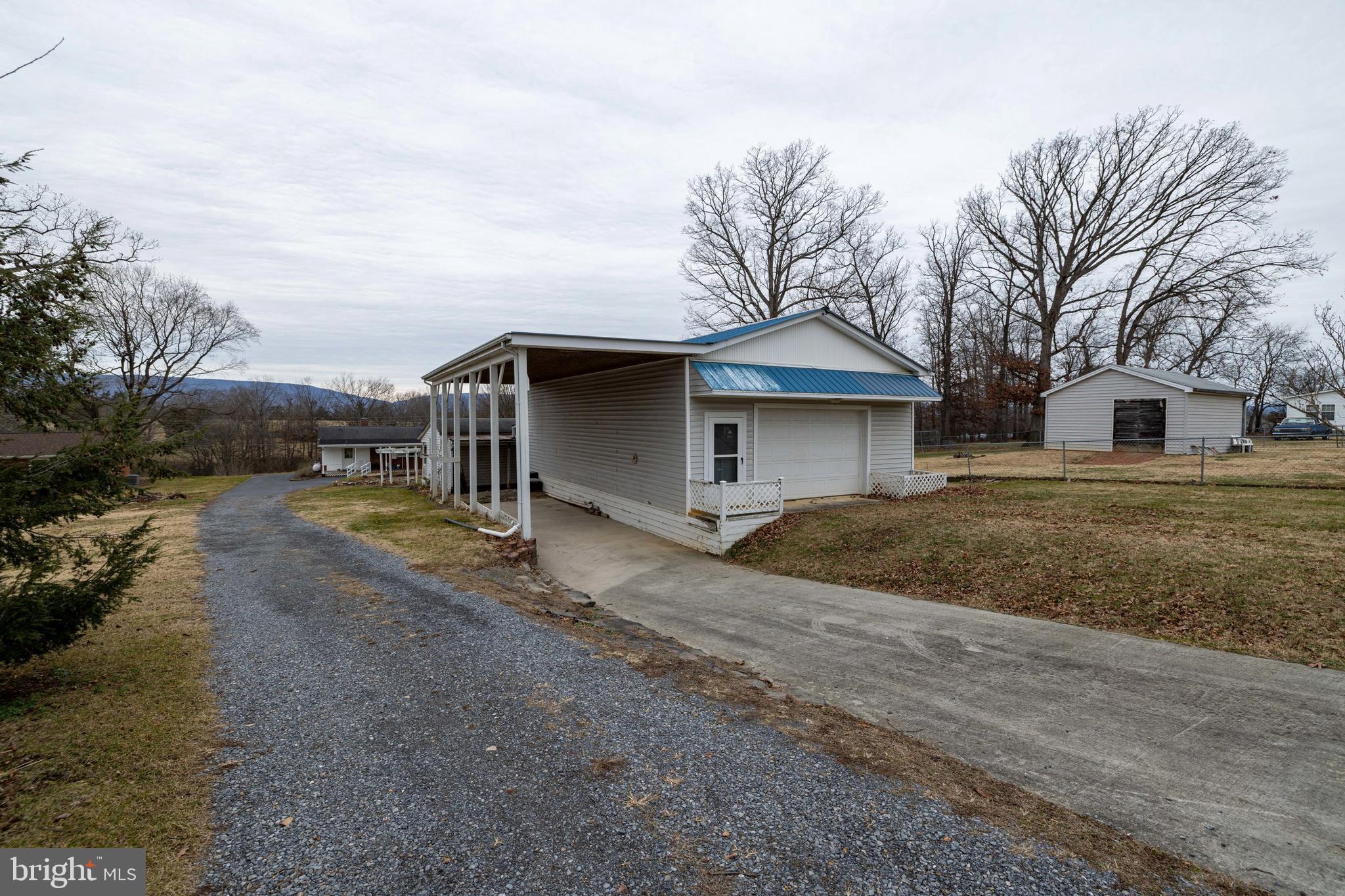 5009 Mill Creek Road Luray, VA 22835 - Photo 57 of 87 a front view of a house with a yard