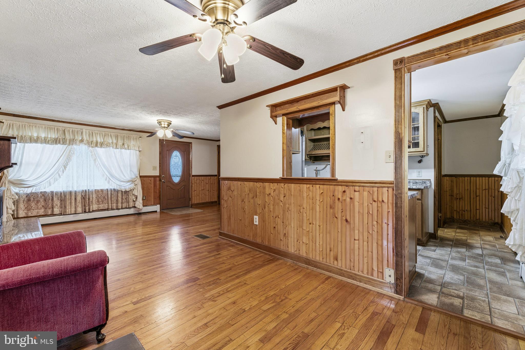 5009 Mill Creek Road Luray, VA 22835 - Photo 6 of 87 a view of a livingroom with furniture window and wooden floor