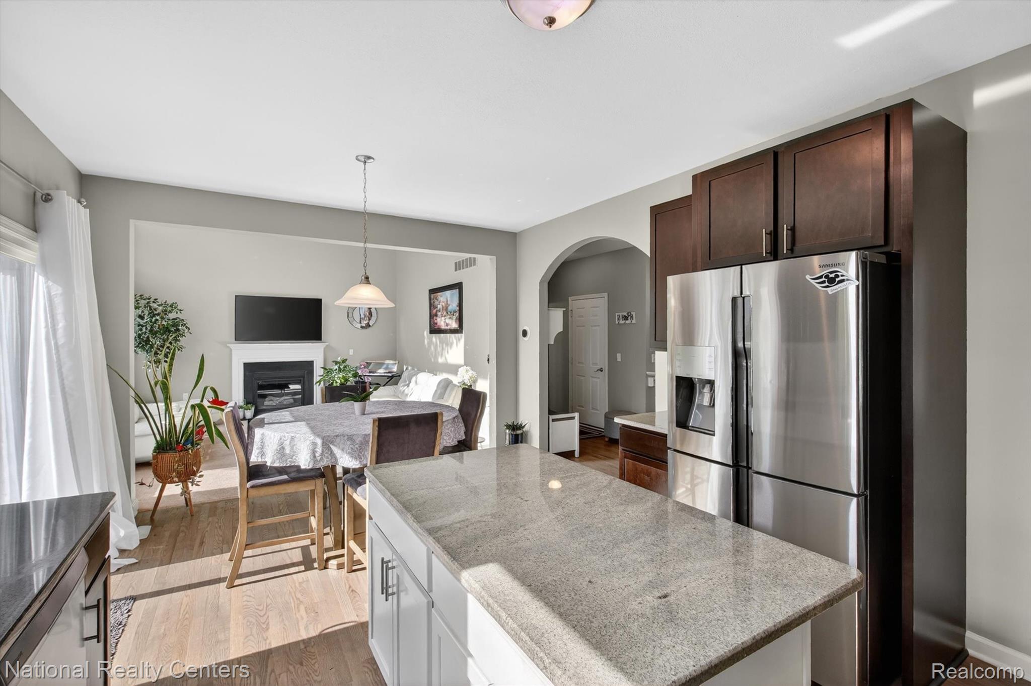 27412 Victoria Road Novi, MI 48374 - Photo 5 of 61 Kitchen featuring a stainless steel French door refrigerator, white cabinetry, and granite countertops