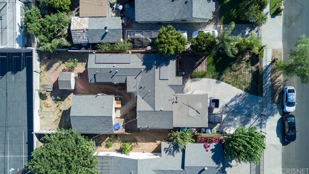 13666 Pinney Street Pacoima, CA 91331 - Photo 1 of 34 an aerial view of a house with a yard and garden