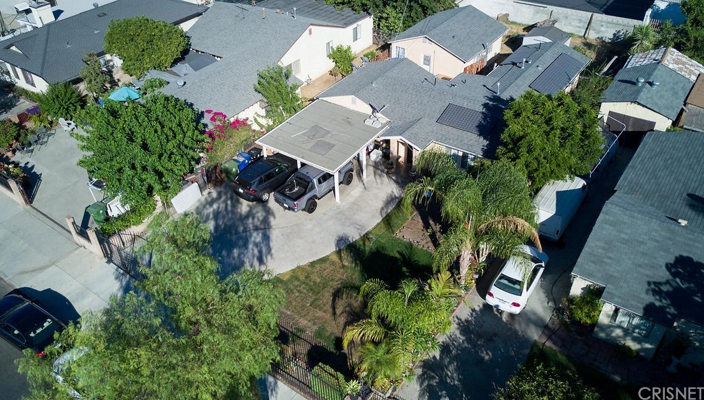13666 Pinney Street Pacoima, CA 91331 - Photo 3 of 34 an aerial view of a house with a yard and outdoor seating