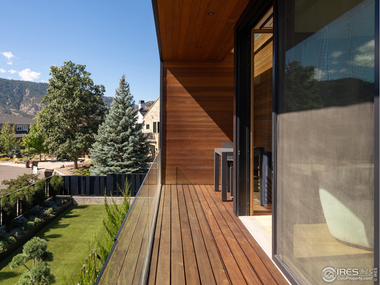 1505 Sunset Boulevard Boulder, CO 80304 - Photo 17 of 40 a view of balcony with wooden floor and potted plants
